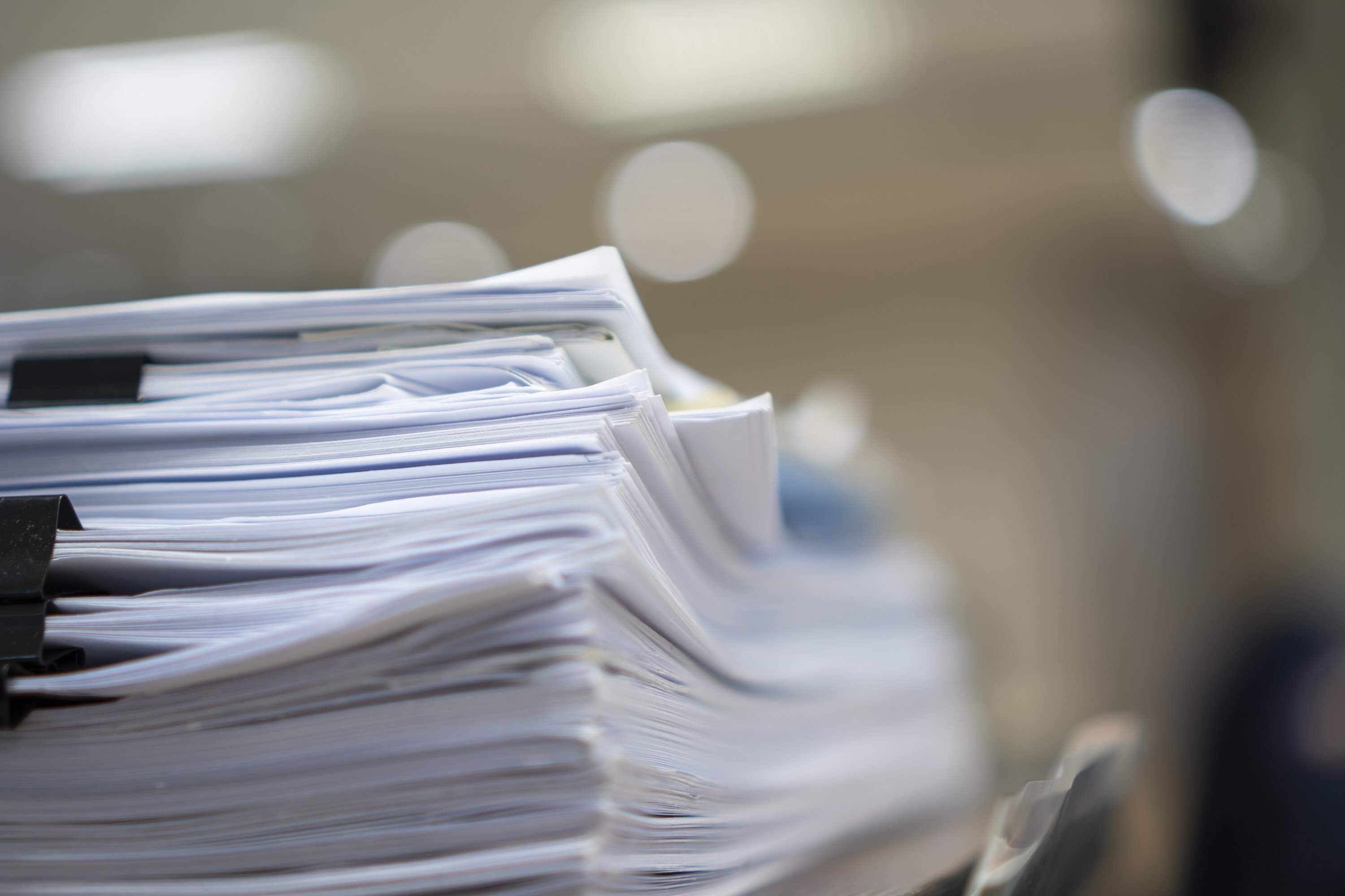 A stack of agreement documents